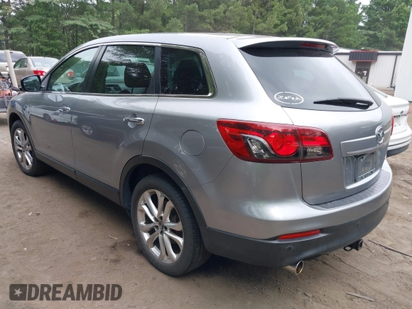 2013 Mazda CX-9 Grand Touring with VIN JM3TB3DV1D0409510, listed as a IAAI auction lot 42578873 with 154,570 mi miles and . Bid and sale history available at DreamBid. Image 3.
