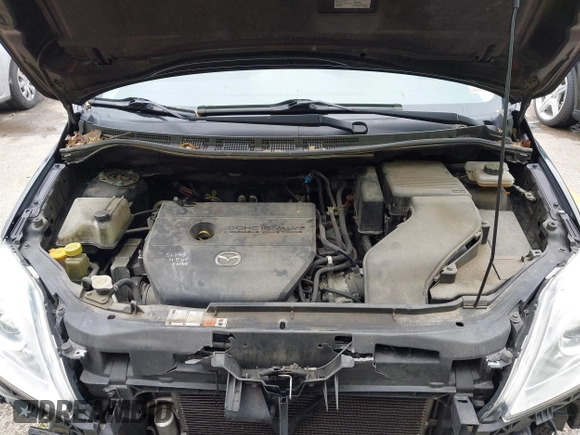2010 Mazda 5 Sport with VIN JM1CR2W33A0360848, listed as a IAAI auction lot 42104824 with 151,084 mi miles and . Bid and sale history available at DreamBid. Image 10.