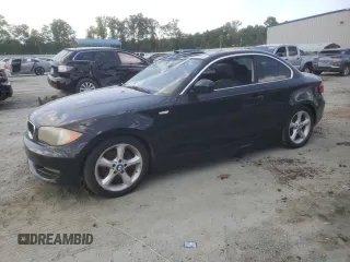 2011 BMW 1 Series 128i with VIN WBAUP7C55BVP21334, listed as a Copart auction lot 61865145 with 98,588 mi miles and Clean title. Bid and sale history available at DreamBid. Image 1.