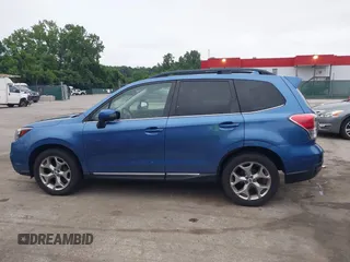 2018 Subaru Forester Touring with VIN JF2SJAWC6JH597365, listed as a IAAI auction lot 42606953 with 66,340 mi miles and . Bid and sale history available at DreamBid. Image 14.
