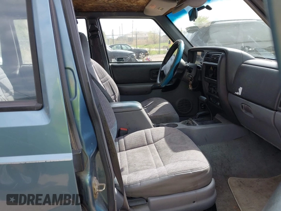 1998 Jeep Cherokee Sport with VIN 1J4FJ68S0WL269553, listed as a IAAI auction lot 42207389 with 261,377 mi miles and . Bid and sale history available at DreamBid. Image 5.