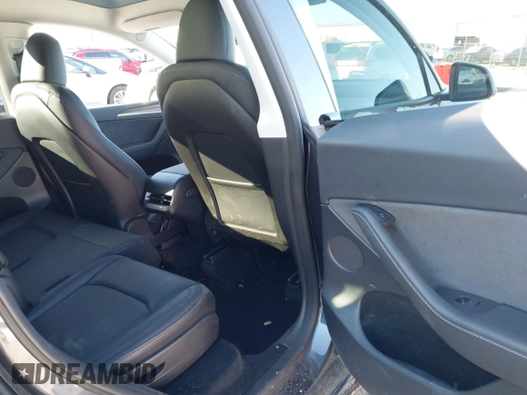 2024 Tesla Model Y Long Range with VIN 7SAYGAEE5RF201368, listed as a IAAI auction lot 41248963 with Not Provided miles and . Bid and sale history available at DreamBid. Image 8.