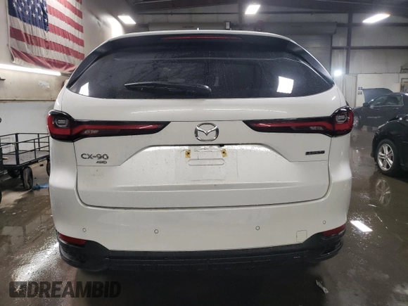 2025 Mazda CX-90 Premium Sport z VIN JM3KKCHD0S1197381, wystawiony jako Copart lot #51160735 z przebiegiem 5112 mil mil oraz Szkody całkowita. Historia ofert i sprzedaży dostępna na DreamBid. Obrazek 6.