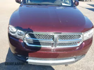 2012 Dodge Durango Crew with VIN 1C4RDHDG9CC330644, listed as a IAAI auction lot 41889758 with 194,295 mi miles and . Bid and sale history available at DreamBid. Image 13.