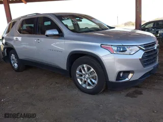 2018 Chevrolet Traverse LT Cloth with VIN 1GNERGKW2JJ250414, listed as a IAAI auction lot 41664779 with 77,214 mi miles. Bid and sale history available at carsss.com. Image 1.