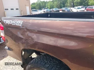 2014 Toyota Tundra Limited with VIN 5TFHW5F19EX400636, listed as a IAAI auction lot 42626818 with 267,402 mi miles and . Bid and sale history available at DreamBid. Image 6.