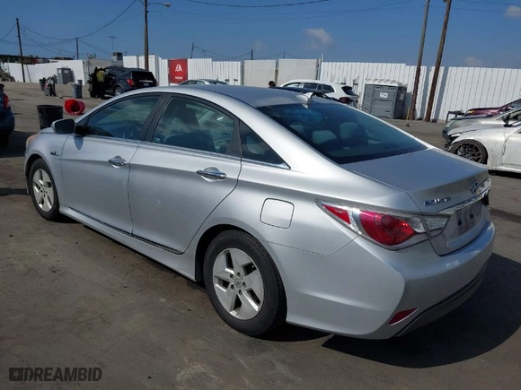 2012 Hyundai Sonata Hybrid with VIN KMHEC4A48CA027852, listed as a IAAI auction lot 41543446 with 163,504 mi miles. Bid and sale history available at carsss.com. Image 3.