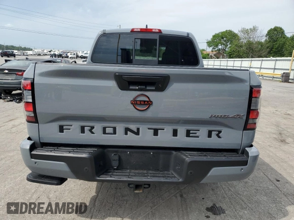 2022 Nissan Frontier SV z VIN 1N6ED1EK5NN631411, wystawiony jako Copart lot #57287645 z przebiegiem 25 027 mil mil oraz Szkoda całkowita • Salvage title. Historia ofert i sprzedaży dostępna na DreamBid. Obrazek 6.