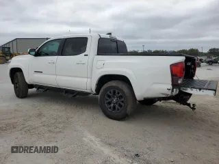 2022 Toyota Tacoma SR5 with VIN 3TMAZ5CN0NM169311, listed as a Copart auction lot 45655195 with 66,113 mi miles and Salvage title. Bid and sale history available at DreamBid. Image 2.