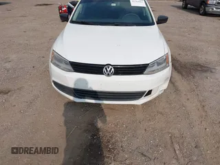 2014 Volkswagen Jetta S with VIN 3VW2K7AJ3EM294563, listed as a IAAI auction lot 42584163 with 149,769 mi miles and . Bid and sale history available at DreamBid. Image 6.