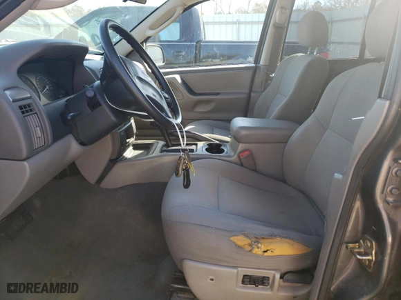 2004 Jeep Grand Cherokee Laredo with VIN 1J4GX48N14C435481, listed as a Copart auction lot 87855975 with 176,273 mi miles and Salvage Title. Bid and sale history available at carsss.com. Image 7.