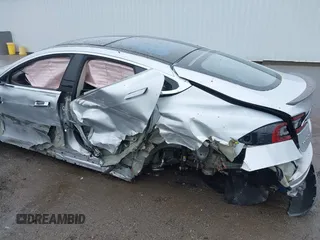 2014 Tesla Model S 60 with VIN 5YJSA1H18EFP30143, listed as a IAAI auction lot 42190505 with Not provided miles and . Bid and sale history available at DreamBid. Image 6.