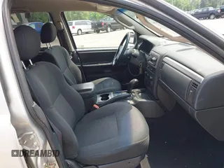 2002 Jeep Grand Cherokee Laredo with VIN 1J4GW48SX2C313093, listed as a IAAI auction lot 42446559 with 200,319 mi miles and . Bid and sale history available at DreamBid. Image 5.