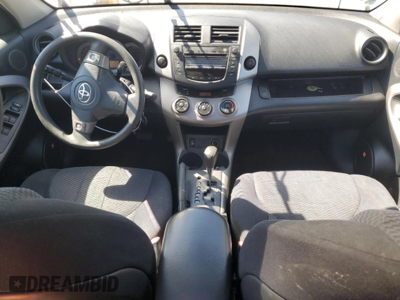 2007 Toyota RAV4 Sport z VIN JTMZK32V076009221, wystawiony jako Copart lot #75331574 z przebiegiem 214 017 mil mil oraz Szkoda całkowita • Salvage title. Historia ofert i sprzedaży dostępna na DreamBid. Obrazek 8.