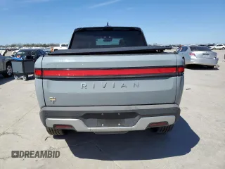 2022 Rivian R1T Adventure z VIN 7FCTGAAAXNN014983, wystawiony jako Copart lot #48987605 z przebiegiem Nie podano mil oraz Szkoda całkowita • Salvage title. Historia ofert i sprzedaży dostępna na DreamBid. Obrazek 6.