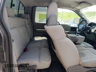 2006 Ford F-150 STX with VIN 1FTRX14W36NB54625, listed as a Copart auction lot 58221215 with 219,195 mi miles and Salvage title. Bid and sale history available at DreamBid. Image 10.