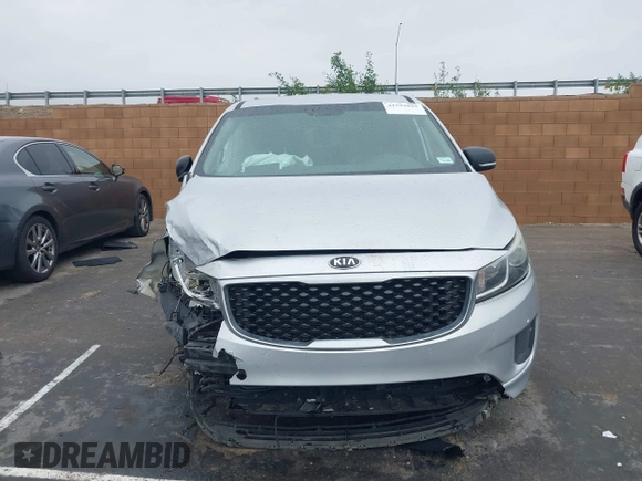 2016 Kia Sedona LX with VIN KNDMB5C13G6212492, listed as a IAAI auction lot 41793029 with 99,176 mi miles. Bid and sale history available at carsss.com. Image 11.