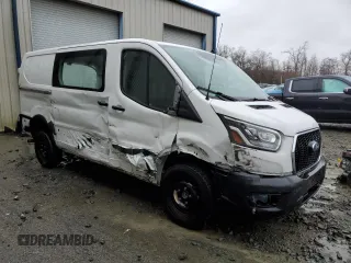 2023 Ford Transit Cargo with VIN 1FTBR1Y87PKA28570, listed as a Copart auction lot 77250383 with Not Provided miles and . Bid and sale history available at DreamBid. Image 4.