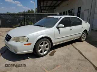 2000 Nissan Maxima GXE z VIN JN1CA31D3YT537410, wystawiony jako Copart lot #68046964 z przebiegiem 313 180 mil mil oraz Czysty tytuł • Clean title. Historia ofert i sprzedaży dostępna na DreamBid. Obrazek 1.