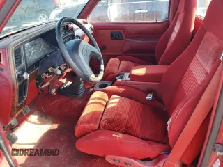 1989 Ford Ranger Splash with VIN 1FTCR10A2KUB58322, listed as a Copart auction lot 77710394 with 890,534 mi miles and Salvage Title. Bid and sale history available at DreamBid. Image 7.