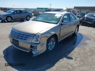 2005 Cadillac STS z VIN 1G6DC67A950171835, wystawiony jako IAAI lot #41599105 z przebiegiem 74 235 mil mil oraz . Historia ofert i sprzedaży dostępna na DreamBid. Obrazek 2.