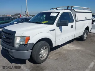 2014 Ford F-150 XL with VIN 1FTNF1CF5EKF62031, listed as a IAAI auction lot 41657632 with 216,689 mi miles. Bid and sale history available at carsss.com. Image 17.