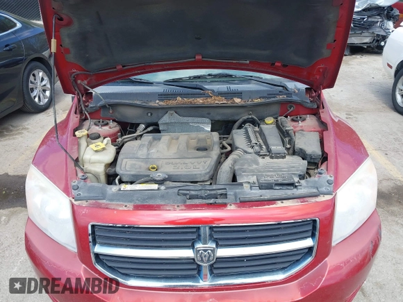 2007 Dodge Caliber SXT with VIN 1B3HB48B87D558516, listed as a IAAI auction lot 42004401 with 217,733 mi miles and . Bid and sale history available at DreamBid. Image 10.