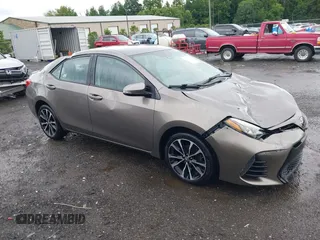 2017 Toyota Corolla L z VIN 2T1BURHE9HC870798, wystawiony jako IAAI lot #42625530 z przebiegiem 149 804 mil mil oraz . Historia ofert i sprzedaży dostępna na DreamBid. Obrazek 1.