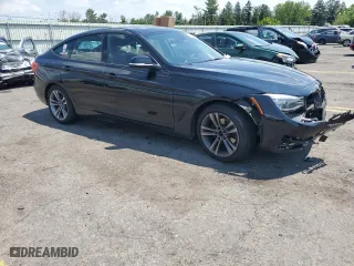 2014 BMW 3 Series Gran Turismo 328i xDrive with VIN WBA3X5C59ED556558, listed as a Copart auction lot 62189044 with 95,383 mi miles and Salvage Title. Bid and sale history available at carsss.com. Image 4.