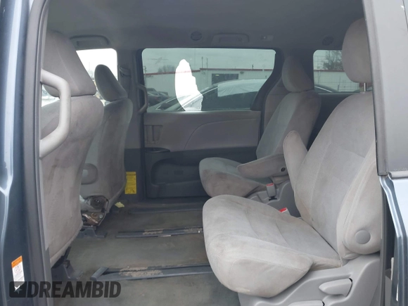 2015 Toyota Sienna L with VIN 5TDZK3DC6FS542457, listed as a IAAI auction lot 41072508 with 167,509 mi miles and . Bid and sale history available at DreamBid. Image 8.