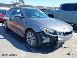 2018 Kia Optima EX with VIN 5XXGU4L37JG227461, listed as a IAAI auction lot 41871797 with 134,760 mi miles. Bid and sale history available at carsss.com. Image 1.