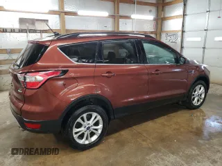 2018 Ford Escape SE z VIN 1FMCU9GD2JUA21582, wystawiony jako Copart lot #56165155 z przebiegiem 88 881 mil mil oraz Czysty tytuł • Clean title. Historia ofert i sprzedaży dostępna na DreamBid. Obrazek 3.