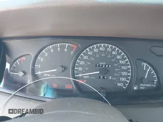 2001 Cadillac Catera z VIN W06VR54R01R003061, wystawiony jako IAAI lot #41989882 z przebiegiem 77 248 mil mil oraz . Historia ofert i sprzedaży dostępna na DreamBid. Obrazek 7.