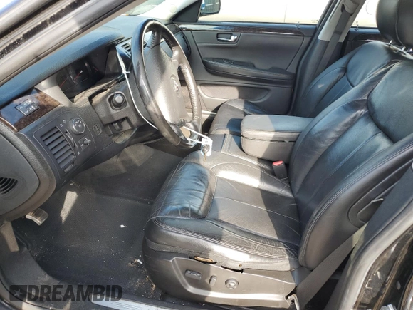 2011 Cadillac DTS z VIN 1G6KA5E69BU102492, wystawiony jako Copart lot #79293954 z przebiegiem 182 372 mil mil oraz Szkoda całkowita • Salvage title. Historia ofert i sprzedaży dostępna na DreamBid. Obrazek 7.