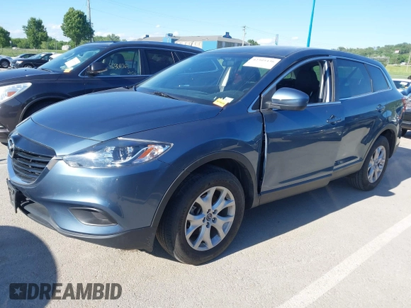2015 Mazda CX-9 Sport z VIN JM3TB2BAXF0465720, wystawiony jako IAAI lot #42305436 z przebiegiem 130 543 mil mil oraz . Historia ofert i sprzedaży dostępna na DreamBid. Obrazek 2.
