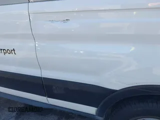 2016 Ford Transit Passenger XL z VIN 1FBZX2CM2GKB51339, wystawiony jako IAAI lot #41429005 z przebiegiem 215 896 mil mil oraz . Historia ofert i sprzedaży dostępna na DreamBid. Obrazek 19.