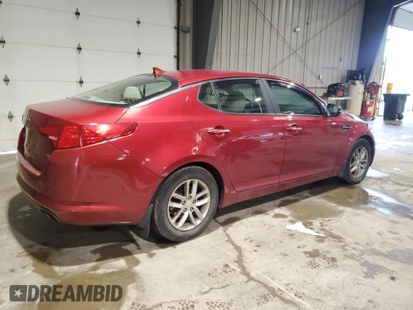 2013 Kia Optima LX z VIN 5XXGM4A75DG159462, wystawiony jako Copart lot #56678015 z przebiegiem 133 434 mil mil oraz Szkoda całkowita • Salvage title. Historia ofert i sprzedaży dostępna na DreamBid. Obrazek 3.