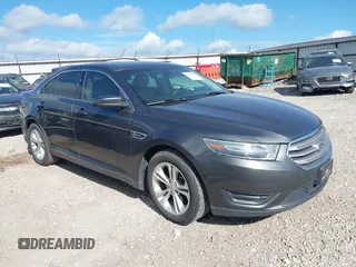 2015 Ford Taurus SEL with VIN 1FAHP2E87FG156969, listed as a IAAI auction lot 42506157 with 99,184 mi miles and . Bid and sale history available at DreamBid. Image 1.