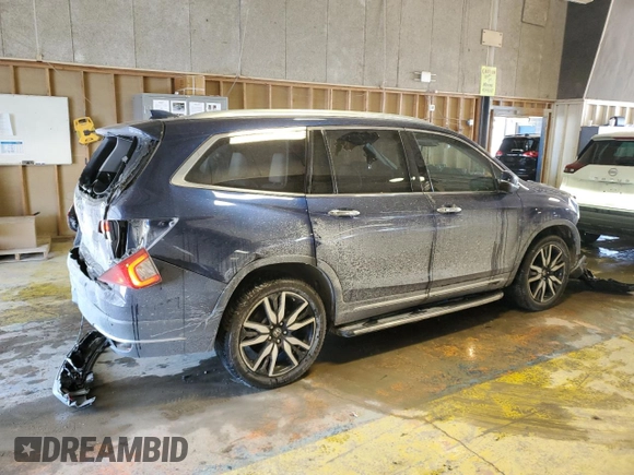 2020 Honda Pilot Touring 7-Passenger z VIN 5FNYF6H67LB031880, wystawiony jako Copart lot #46083925 z przebiegiem 59 729 mil mil oraz Szkoda całkowita • Salvage title. Historia ofert i sprzedaży dostępna na DreamBid. Obrazek 3.