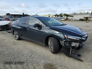 2018 Honda Clarity z VIN JHMZC5F15JC012624, wystawiony jako Copart lot #51021235 z przebiegiem 96 340 mil mil oraz Szkoda całkowita • Salvage title. Historia ofert i sprzedaży dostępna na DreamBid. Obrazek 4.