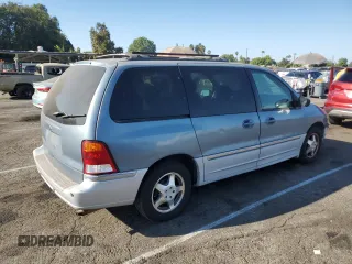 2000 Ford Windstar SEL with VIN 2FMZA5340YBB56738, listed as a Copart auction lot 70502084 with 89,457 mi miles and Salvage Title. Bid and sale history available at carsss.com. Image 3.