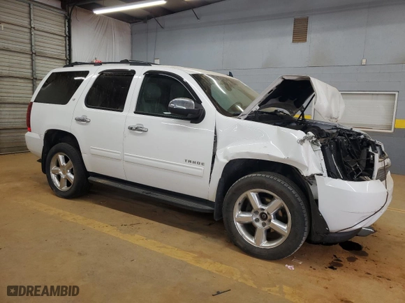 2013 Chevrolet Tahoe LT with VIN 1GNSKBE07DR239965, listed as a Copart auction lot 47730235 with 99,102 mi miles and Salvage Title. Bid and sale history available at carsss.com. Image 4.