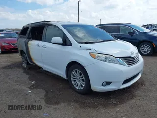 2012 Toyota Sienna XLE AAS with VIN 5TDYK3DC7CS244376, listed as a IAAI auction lot 41500215 with Not Provided miles. Bid and sale history available at carsss.com. Image 1.