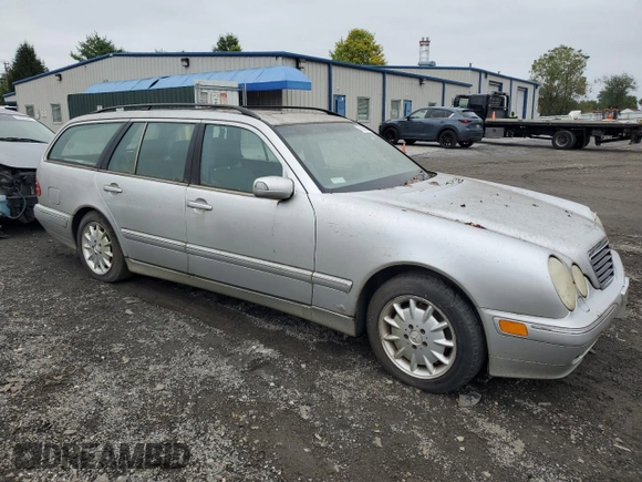 2000 Mercedes-Benz E-Class AWD with VIN WDBJH82J6YX039226, listed as a Copart auction lot 72559034 with 213,680 mi miles and Clean Title. Bid and sale history available at carsss.com. Image 4.