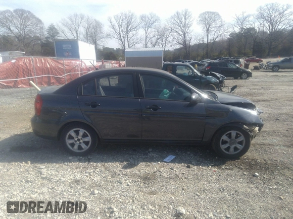 2006 Hyundai Accent GLS z VIN KMHCN46C66U027692, wystawiony jako IAAI lot #41796140 z przebiegiem 233 488 mil mil oraz . Historia ofert i sprzedaży dostępna na DreamBid. Obrazek 13.
