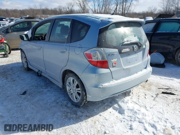 2009 Honda Fit Sport with VIN JHMGE884X9S026613, listed as a IAAI auction lot 41593112 with 144,736 mi miles. Bid and sale history available at carsss.com. Image 3.