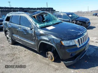 2013 Jeep Grand Cherokee Overland with VIN 1C4RJFCT2DC536899, listed as a IAAI auction lot 41853217 with 1 mi miles. Bid and sale history available at carsss.com. Image 1.