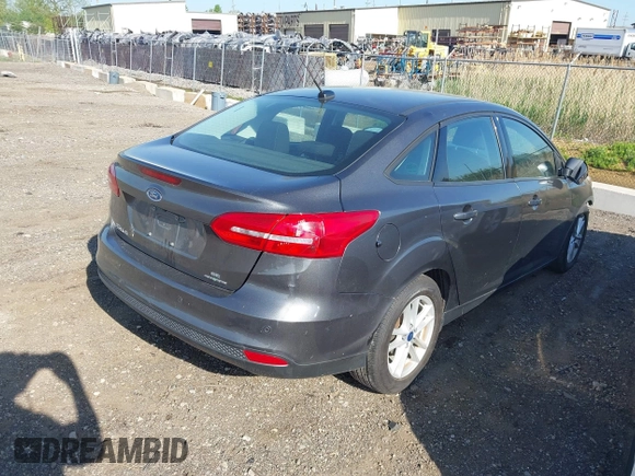 2016 Ford Focus SE with VIN 1FADP3F23GL252346, listed as a IAAI auction lot 42247184 with 99,025 mi miles and . Bid and sale history available at DreamBid. Image 4.