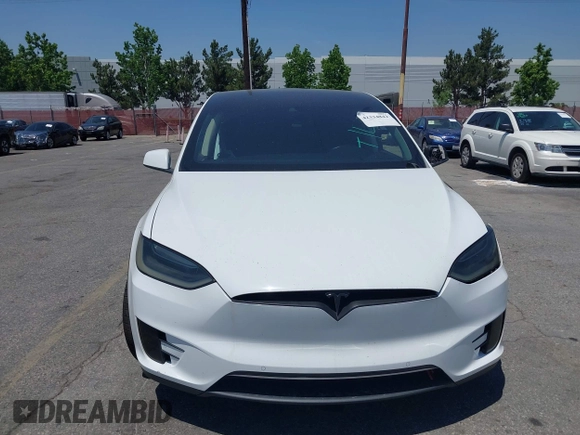 2016 Tesla Model X 70D z VIN 5YJXCAE29GF002170, wystawiony jako IAAI lot #42334842 z przebiegiem 119 104 mil mil oraz . Historia ofert i sprzedaży dostępna na DreamBid. Obrazek 13.