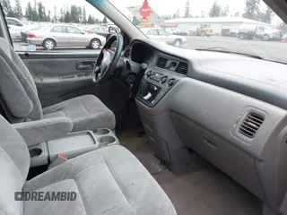 2003 Honda Odyssey EX z VIN 5FNRL18683B080893, wystawiony jako IAAI lot #41840931 z przebiegiem 218 794 mil mil oraz . Historia ofert i sprzedaży dostępna na DreamBid. Obrazek 5.